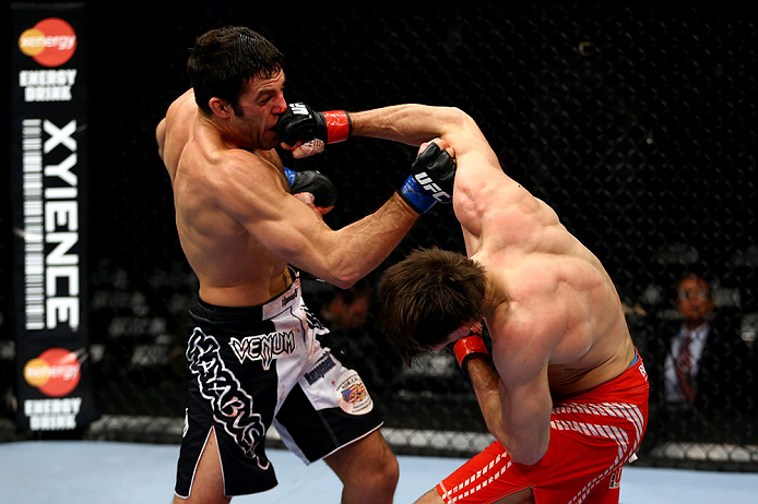 CHICAGO, IL - JANUARY 26:  David Mitchell (L) punches Simeon Thoresen (R) during their Welterweight Bout part of Facebook Prelims at United Center on January 26, 2013 in Chicago, Illinois.  (Photo by Al Bello/Zuffa LLC/Zuffa LLC Via Getty Images)