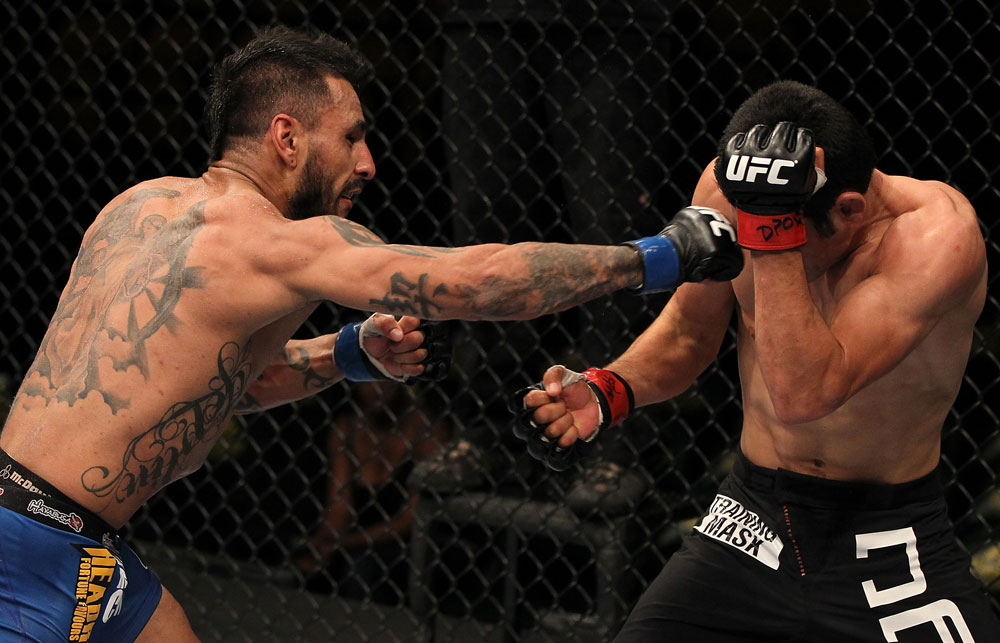 FAIRFAX, VA - MAY 15:  (L-R) Francisco Rivera punches Alex Soto in a bantamweight bout during the UFC on Fuel TV event at Patriot Center on May 15, 2012 in Fairfax, Virginia.  (Photo by Josh Hedges/Zuffa LLC/Zuffa LLC via Getty Images)