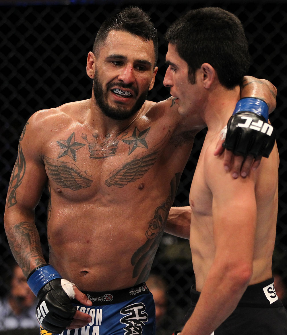 FAIRFAX, VA - MAY 15:  (L-R) Francisco Rivera and Alex Soto hug after their three-round bantamweight bout during the UFC on Fuel TV event at Patriot Center on May 15, 2012 in Fairfax, Virginia.  (Photo by Josh Hedges/Zuffa LLC/Zuffa LLC via Getty Images)