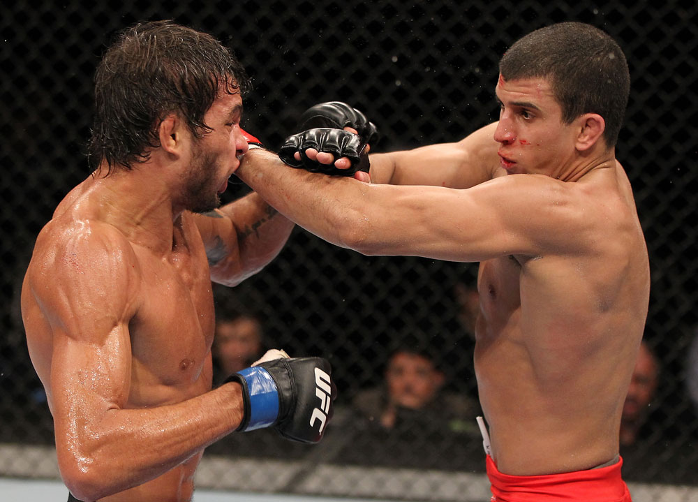 BELO HORIZONTE, BRAZIL - JUNE 23: (R-L) Felipe Arantes and Milton Vieira exchange punches during their UFC 147 featherweight bout at Estadio Jornalista Felipe Drummond on June 23, 2012 in Belo Horizonte, Brazil. (Photo by Josh Hedges/Zuffa LLC/Zuffa LLC via Getty Images)