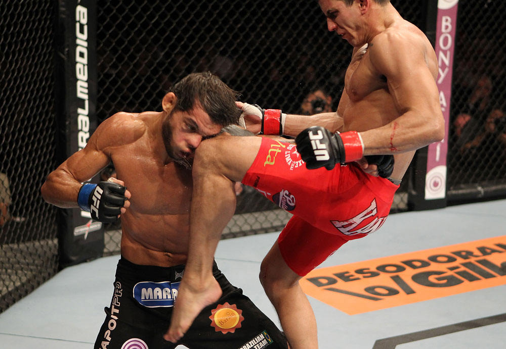 BELO HORIZONTE, BRAZIL - JUNE 23: (R-L) Felipe Arantes lands a flying knee against Milton Vieira during their UFC 147 featherweight bout at Estadio Jornalista Felipe Drummond on June 23, 2012 in Belo Horizonte, Brazil. (Photo by Josh Hedges/Zuffa LLC/Zuffa LLC via Getty Images)
