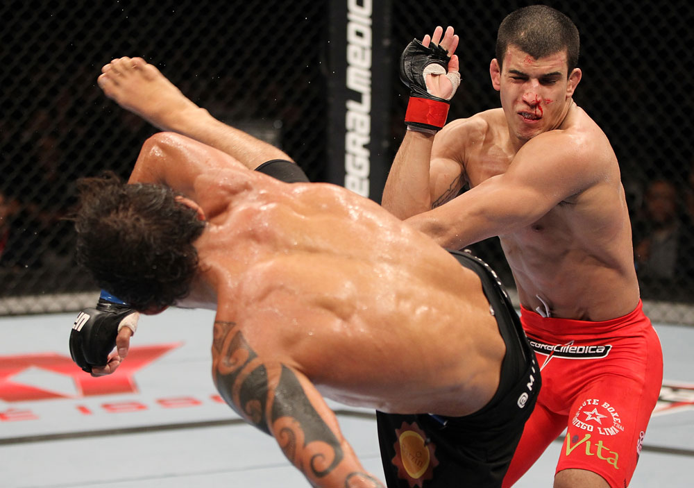 BELO HORIZONTE, BRAZIL - JUNE 23: (L-R) Milton Vieira delivers a spinning kick to the head of Felipe Arantes during their UFC 147 featherweight bout at Estadio Jornalista Felipe Drummond on June 23, 2012 in Belo Horizonte, Brazil. (Photo by Josh Hedges/Zuffa LLC/Zuffa LLC via Getty Images)