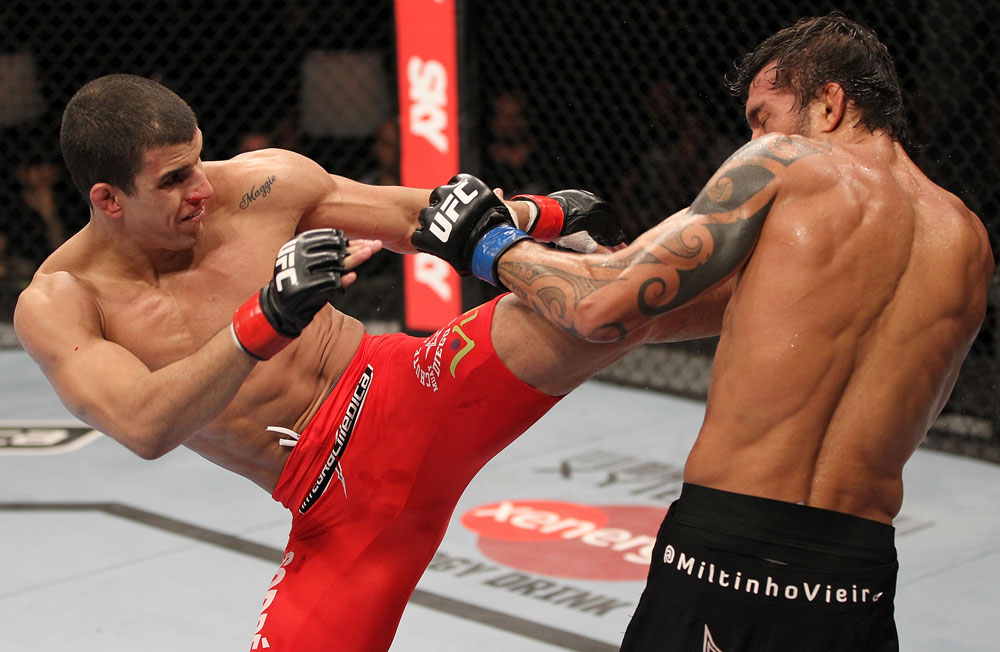 BELO HORIZONTE, BRAZIL - JUNE 23: (L-R) Felipe Arantes lands a kick against Milton Vieira during their UFC 147 featherweight bout at Estadio Jornalista Felipe Drummond on June 23, 2012 in Belo Horizonte, Brazil. (Photo by Josh Hedges/Zuffa LLC/Zuffa LLC via Getty Images)