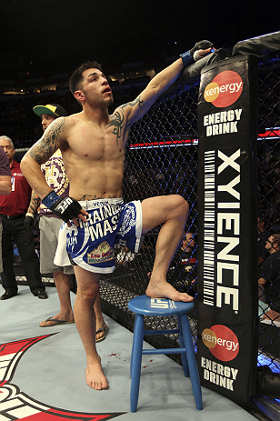 CALGARY, CANADA - JULY 21: Daniel Pineda looks to the crowd after being knocked out by Antonio Carvalho during their featherweight bout at UFC 149 inside the Scotiabank Saddledome on July 21, 2012 in Calgary, Alberta, Canada.  (Photo by Nick Laham/Zuffa LLC/Zuffa LLC via Getty Images)