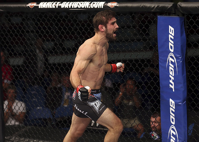 CALGARY, CANADA - JULY 21:  Antonio Carvalho celebrates after knocking out Daniel Pineda during their featherweight bout at UFC 149 inside the Scotiabank Saddledome on July 21, 2012 in Calgary, Alberta, Canada.  (Photo by Nick Laham/Zuffa LLC/Zuffa LLC via Getty Images)