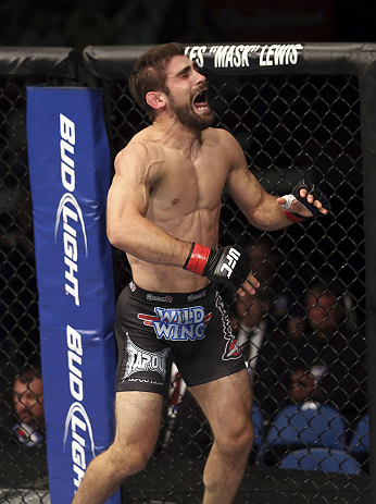 CALGARY, CANADA - JULY 21:  Antonio Carvalho celebrates after knocking out Daniel Pineda during their featherweight bout at UFC 149 inside the Scotiabank Saddledome on July 21, 2012 in Calgary, Alberta, Canada.  (Photo by Nick Laham/Zuffa LLC/Zuffa LLC via Getty Images)