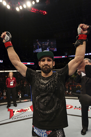 CALGARY, CANADA - JULY 21:  Antonio Carvalho celebrates after defeating Daniel Pineda by knockout during their featherweight bout at UFC 149 inside the Scotiabank Saddledome on July 21, 2012 in Calgary, Alberta, Canada.  (Photo by Nick Laham/Zuffa LLC/Zuffa LLC via Getty Images)