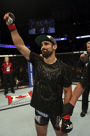 CALGARY, CANADA - JULY 21:  Antonio Carvalho celebrates after defeating Daniel Pineda by knockout during their featherweight bout at UFC 149 inside the Scotiabank Saddledome on July 21, 2012 in Calgary, Alberta, Canada.  (Photo by Nick Laham/Zuffa LLC/Zuffa LLC via Getty Images)