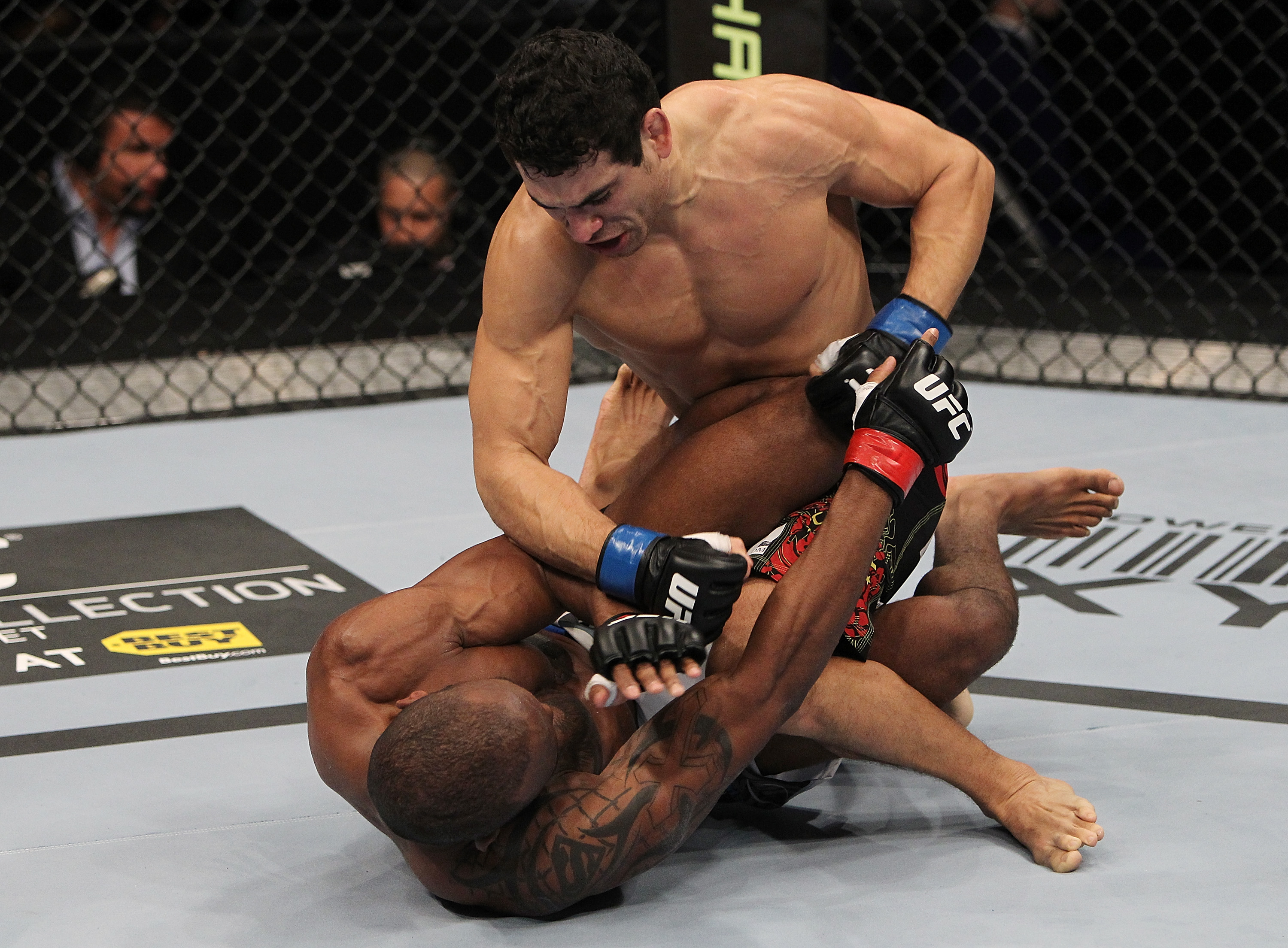 SAN JOSE, CA - NOVEMBER 19: Danny Castillo (top) punches Shamar Bailey (bottom) during an UFC Lightweight bout at the HP Pavillion on November 19, 2011 in San Jose, California. (Photo by Josh Hedges/Zuffa LLC/Zuffa LLC via Getty Images)