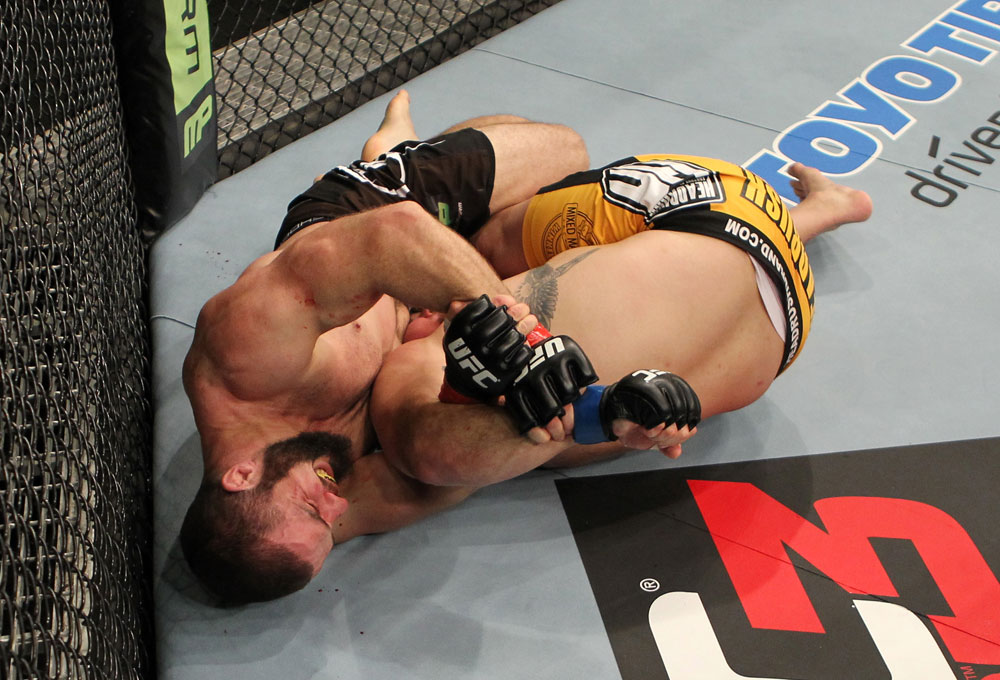SYDNEY, AUSTRALIA - MARCH 03: (L-R) Oli Thompson attempts a shoulder lock submission against Shawn Jordan in a heavyweight bout during the UFC on FX event at Allphones Arena on March 3, 2012 in Sydney, Australia. (Photo by Josh Hedges/Zuffa LLC/Zuffa LLC via Getty Images) *** Local Caption *** Oli Thompson; Shawn Jordan