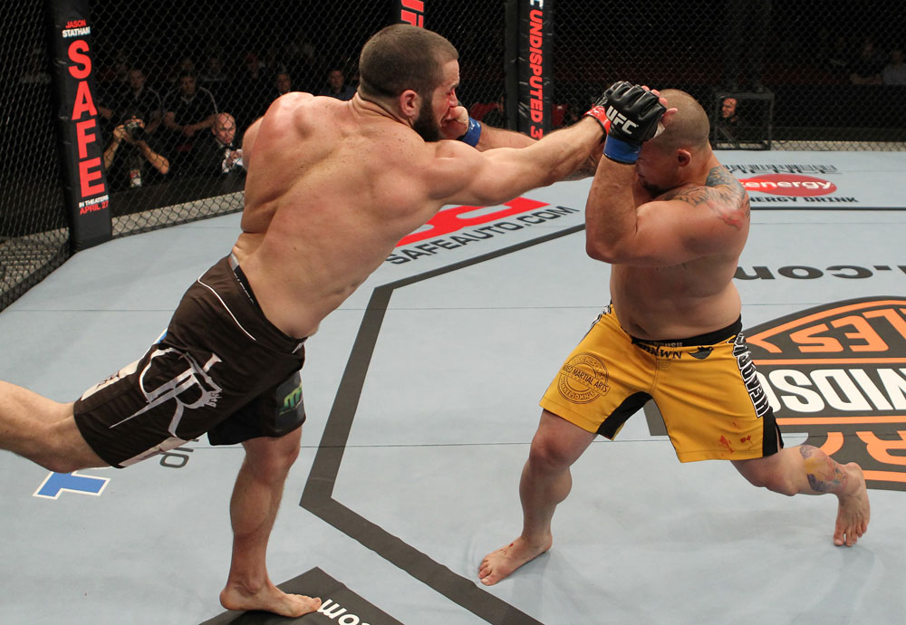 SYDNEY, AUSTRALIA - MARCH 03: (L-R) Oli Thompson punches Shawn Jordan in a heavyweight bout during the UFC on FX event at Allphones Arena on March 3, 2012 in Sydney, Australia. (Photo by Josh Hedges/Zuffa LLC/Zuffa LLC via Getty Images) *** Local Caption *** Oli Thompson; Shawn Jordan