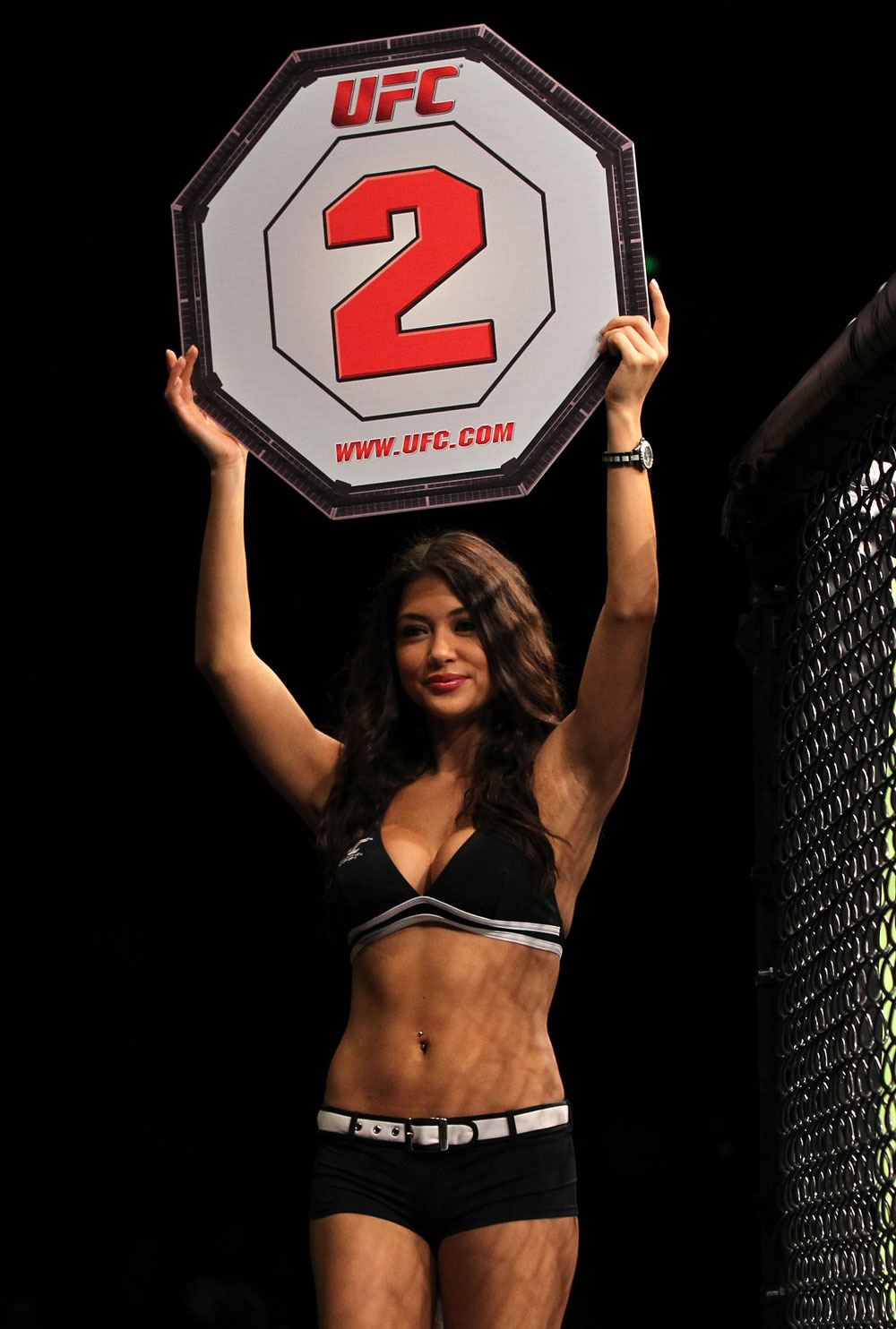 SYDNEY, AUSTRALIA - MARCH 03: UFC Octagon Girl Arianny Celeste introduces round two during the Jordan v Thompson bout during the UFC on FX event at Allphones Arena on March 3, 2012 in Sydney, Australia. (Photo by Josh Hedges/Zuffa LLC/Zuffa LLC via Getty Images) *** Local Caption *** Arianny Celeste