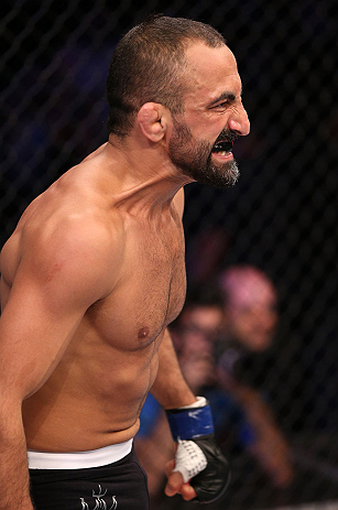 RIO DE JANEIRO, BRAZIL - OCTOBER 13:  Reza Madadi stands in the Octagon before his lightweight fight against Cristiano Marcello at UFC 153 inside HSBC Arena on October 13, 2012 in Rio de Janeiro, Brazil.  (Photo by Josh Hedges/Zuffa LLC/Zuffa LLC via Getty Images)