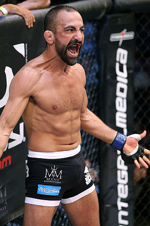 RIO DE JANEIRO, BRAZIL - OCTOBER 13:  Reza Madadi stands in the Octagon before his lightweight fight against Cristiano Marcello at UFC 153 inside HSBC Arena on October 13, 2012 in Rio de Janeiro, Brazil.  (Photo by Josh Hedges/Zuffa LLC/Zuffa LLC via Getty Images)