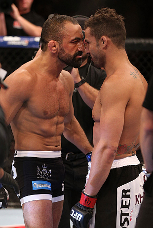 RIO DE JANEIRO, BRAZIL - OCTOBER 13:  (L-R) Reza Madadi and Cristiano Marcello stand nose-to-nose in the Octagon before their lightweight fight at UFC 153 inside HSBC Arena on October 13, 2012 in Rio de Janeiro, Brazil.  (Photo by Josh Hedges/Zuffa LLC/Zuffa LLC via Getty Images)