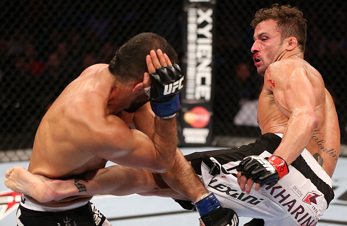 RIO DE JANEIRO, BRAZIL - OCTOBER 13:  (R-L) Cristiano Marcello kicks Reza Madadi during their lightweight fight at UFC 153 inside HSBC Arena on October 13, 2012 in Rio de Janeiro, Brazil.  (Photo by Josh Hedges/Zuffa LLC/Zuffa LLC via Getty Images)