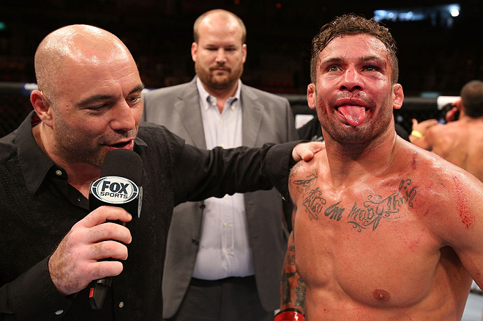 RIO DE JANEIRO, BRAZIL - OCTOBER 13:  (R-L) Cristiano Marcello is interviewed by Joe Rogan after defeating Reza Madadi during their lightweight fight at UFC 153 inside HSBC Arena on October 13, 2012 in Rio de Janeiro, Brazil.  (Photo by Josh Hedges/Zuffa LLC/Zuffa LLC via Getty Images)