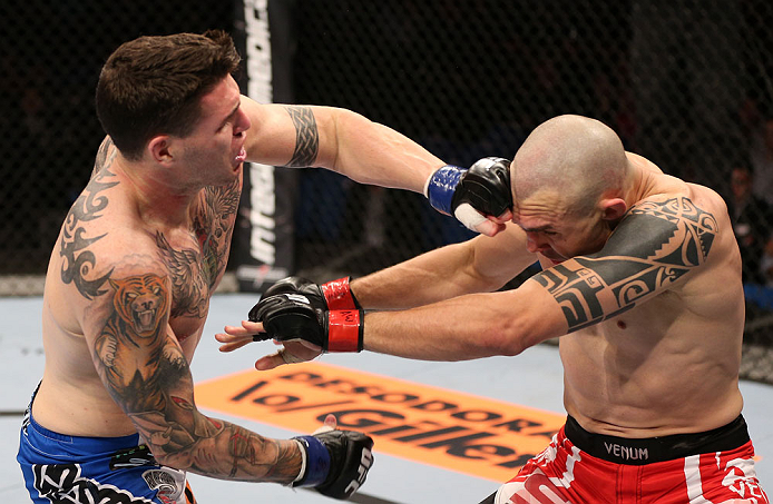 RIO DE JANEIRO, BRAZIL - OCTOBER 13:  (L-R) Chris Camozzi punches Luiz Cane during their middleweight fight at UFC 153 inside HSBC Arena on October 13, 2012 in Rio de Janeiro, Brazil.  (Photo by Josh Hedges/Zuffa LLC/Zuffa LLC via Getty Images)