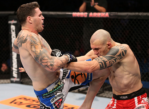 RIO DE JANEIRO, BRAZIL - OCTOBER 13:  (L-R) Chris Camozzi delivers a knee strike against Luiz Cane during their middleweight fight at UFC 153 inside HSBC Arena on October 13, 2012 in Rio de Janeiro, Brazil.  (Photo by Josh Hedges/Zuffa LLC/Zuffa LLC via Getty Images)