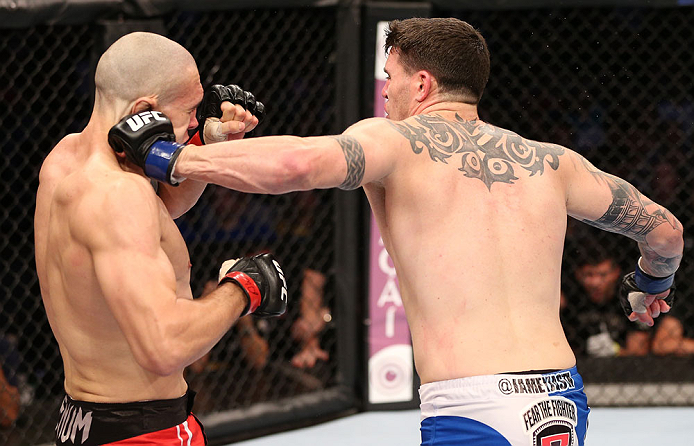 RIO DE JANEIRO, BRAZIL - OCTOBER 13:  (R-L) Chris Camozzi punches Luiz Cane during their middleweight fight at UFC 153 inside HSBC Arena on October 13, 2012 in Rio de Janeiro, Brazil.  (Photo by Josh Hedges/Zuffa LLC/Zuffa LLC via Getty Images)