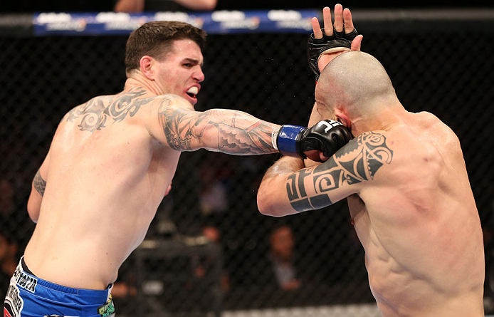 RIO DE JANEIRO, BRAZIL - OCTOBER 13:  (L-R) Chris Camozzi punches Luiz Cane during their middleweight fight at UFC 153 inside HSBC Arena on October 13, 2012 in Rio de Janeiro, Brazil.  (Photo by Josh Hedges/Zuffa LLC/Zuffa LLC via Getty Images)