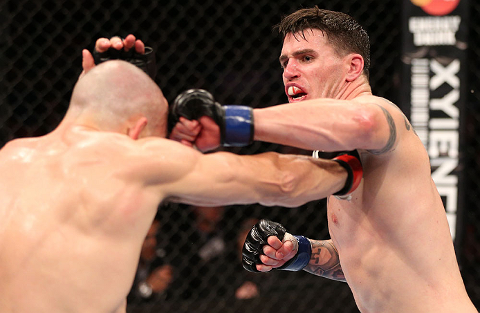 RIO DE JANEIRO, BRAZIL - OCTOBER 13:  (R-L) Chris Camozzi punches Luiz Cane during their middleweight fight at UFC 153 inside HSBC Arena on October 13, 2012 in Rio de Janeiro, Brazil.  (Photo by Josh Hedges/Zuffa LLC/Zuffa LLC via Getty Images)