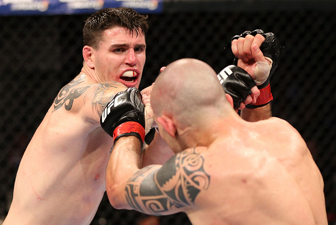 RIO DE JANEIRO, BRAZIL - OCTOBER 13:  (L-R) Chris Camozzi punches Luiz Cane during their middleweight fight at UFC 153 inside HSBC Arena on October 13, 2012 in Rio de Janeiro, Brazil.  (Photo by Josh Hedges/Zuffa LLC/Zuffa LLC via Getty Images)