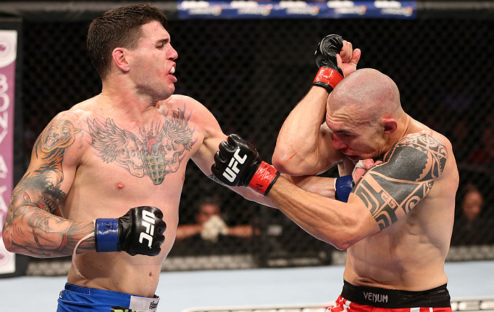 RIO DE JANEIRO, BRAZIL - OCTOBER 13:  (L-R) Chris Camozzi punches Luiz Cane during their middleweight fight at UFC 153 inside HSBC Arena on October 13, 2012 in Rio de Janeiro, Brazil.  (Photo by Josh Hedges/Zuffa LLC/Zuffa LLC via Getty Images)