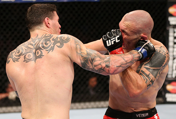 RIO DE JANEIRO, BRAZIL - OCTOBER 13:  (L-R) Chris Camozzi punches Luiz Cane during their middleweight fight at UFC 153 inside HSBC Arena on October 13, 2012 in Rio de Janeiro, Brazil.  (Photo by Josh Hedges/Zuffa LLC/Zuffa LLC via Getty Images)