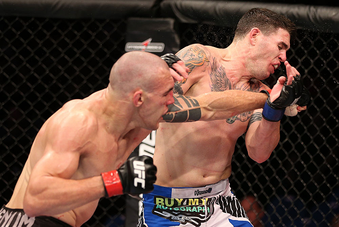 RIO DE JANEIRO, BRAZIL - OCTOBER 13:  (L-R) Luiz Cane punches Chris Camozzi during their middleweight fight at UFC 153 inside HSBC Arena on October 13, 2012 in Rio de Janeiro, Brazil.  (Photo by Josh Hedges/Zuffa LLC/Zuffa LLC via Getty Images)