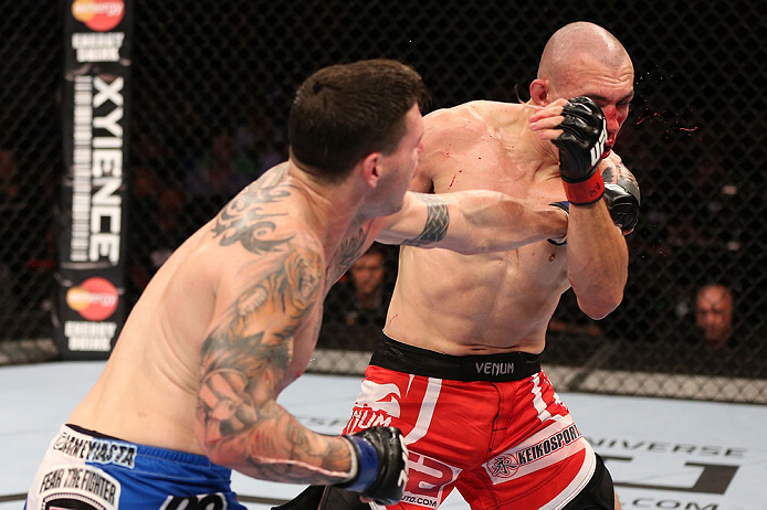 RIO DE JANEIRO, BRAZIL - OCTOBER 13:  (L-R) Chris Camozzi punches Luiz Cane during their middleweight fight at UFC 153 inside HSBC Arena on October 13, 2012 in Rio de Janeiro, Brazil.  (Photo by Josh Hedges/Zuffa LLC/Zuffa LLC via Getty Images)