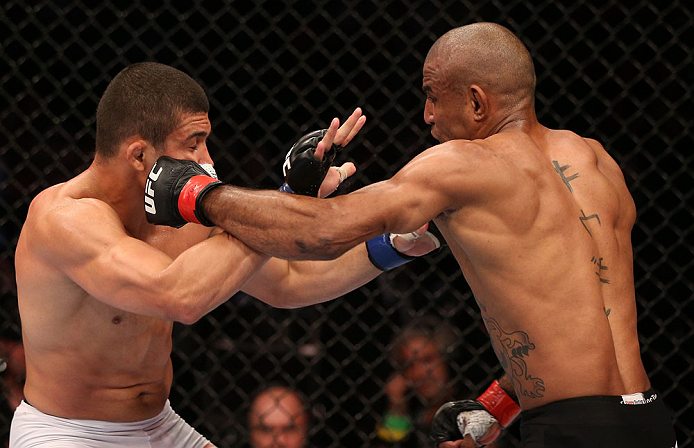 RIO DE JANEIRO, BRAZIL - OCTOBER 13:  (R-L) Sergio Moraes punches Renee Forte during their welterweight fight at UFC 153 inside HSBC Arena on October 13, 2012 in Rio de Janeiro, Brazil.  (Photo by Josh Hedges/Zuffa LLC/Zuffa LLC via Getty Images)