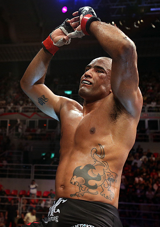 RIO DE JANEIRO, BRAZIL - OCTOBER 13:  Sergio Moraes reacts after defeating Renee Forte during their welterweight fight at UFC 153 inside HSBC Arena on October 13, 2012 in Rio de Janeiro, Brazil.  (Photo by Josh Hedges/Zuffa LLC/Zuffa LLC via Getty Images)