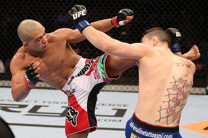 Brandao delivers a high kick against Gambino Brandao delivers a high kick against Gambino