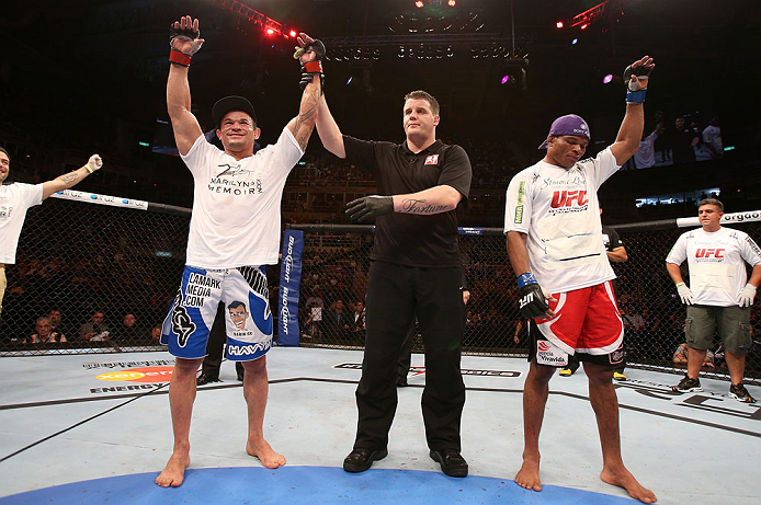 RIO DE JANEIRO, BRAZIL - OCTOBER 13:  Gleison Tibau (L) reacts after defeating Francisco Trinaldo during their lightweight fight at UFC 153 inside HSBC Arena on October 13, 2012 in Rio de Janeiro, Brazil.  (Photo by Josh Hedges/Zuffa LLC/Zuffa LLC via Getty Images)