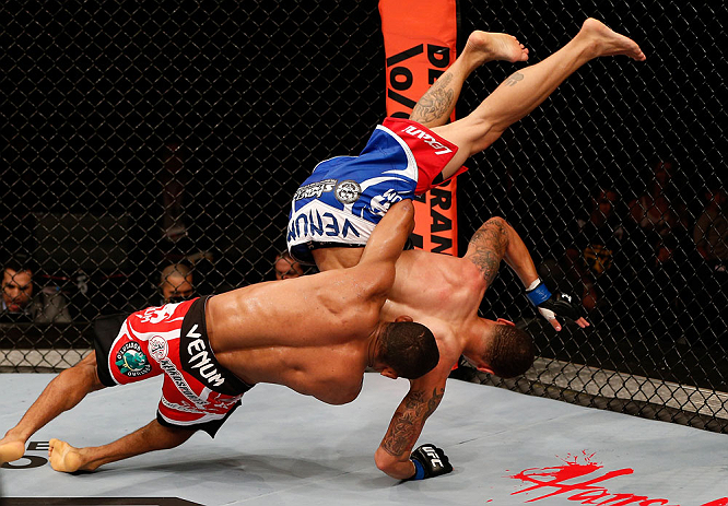SAO PAULO, BRAZIL - JANUARY 19: (L-R) Francisco Trinaldo slams C.J. Keith in their lightweight fight at the UFC on FX event on January 19, 2013 at Ibirapuera Gymnasium in Sao Paulo, Brazil. (Photo by Josh Hedges/Zuffa LLC/Zuffa LLC via Getty Images)