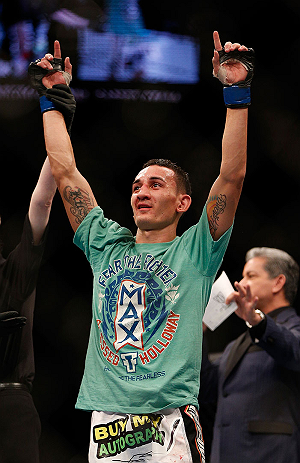LAS VEGAS, NV - DECEMBER 29:  Max Holloway is declared the winner over Leonard Garcia after their featherweight fight at UFC 155 on December 29, 2012 at MGM Grand Garden Arena in Las Vegas, Nevada. (Photo by Josh Hedges/Zuffa LLC/Zuffa LLC via Getty Images) *** Local Caption *** Leonard Garcia; Max Holloway