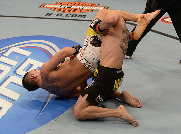 LAS VEGAS, NV - FEBRUARY 02: (L-R) Dustin Kimura attempts to submit Chico Camus during their bantamweight fight at UFC 156 on February 2, 2013 at the Mandalay Bay Events Center in Las Vegas, Nevada. (Photo by Donald Miralle/Zuffa LLC/Zuffa LLC via Getty Images) *** Local Caption *** Chico Camus; Dustin Kimura