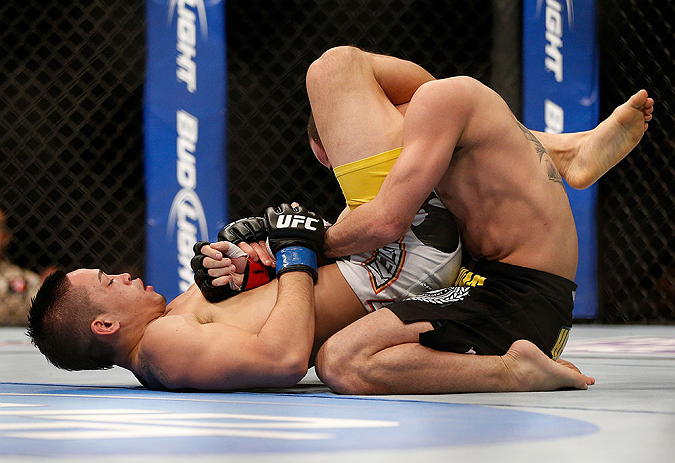 LAS VEGAS, NV - FEBRUARY 02: Dustin Kimura (left) attempts to submit Chico Camus during their bantamweight fight at UFC 156 on February 2, 2013 at the Mandalay Bay Events Center in Las Vegas, Nevada. (Photo by Josh Hedges/Zuffa LLC/Zuffa LLC via Getty Images) *** Local Caption *** Chico Camus; Dustin Kimura
