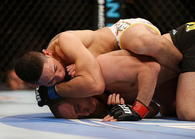 LAS VEGAS, NV - FEBRUARY 02: Dustin Kimura (top) attempts to submit Chico Camus during their bantamweight fight at UFC 156 on February 2, 2013 at the Mandalay Bay Events Center in Las Vegas, Nevada. (Photo by Josh Hedges/Zuffa LLC/Zuffa LLC via Getty Images) *** Local Caption *** Chico Camus; Dustin Kimura