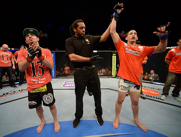 LAS VEGAS, NV - FEBRUARY 02: Dustin Kimura (right) reacts to his victory over Chico Camus (left) after their bantamweight fight at UFC 156 on February 2, 2013 at the Mandalay Bay Events Center in Las Vegas, Nevada. (Photo by Donald Miralle/Zuffa LLC/Zuffa LLC via Getty Images) *** Local Caption *** Chico Camus; Dustin Kimura
