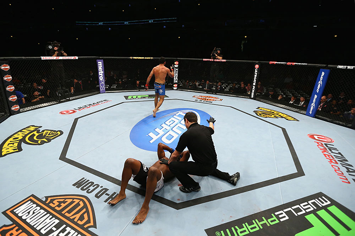 CHICAGO, IL - JANUARY 26:  Rafael Natal celebrates after defeating Sean Spencer as he gets looked at by the judge during their Middleweight Bout part of UFC on FOX at United Center on January 26, 2013 in Chicago, Illinois.  (Photo by Al Bello/Zuffa LLC/Zuffa LLC Via Getty Images)