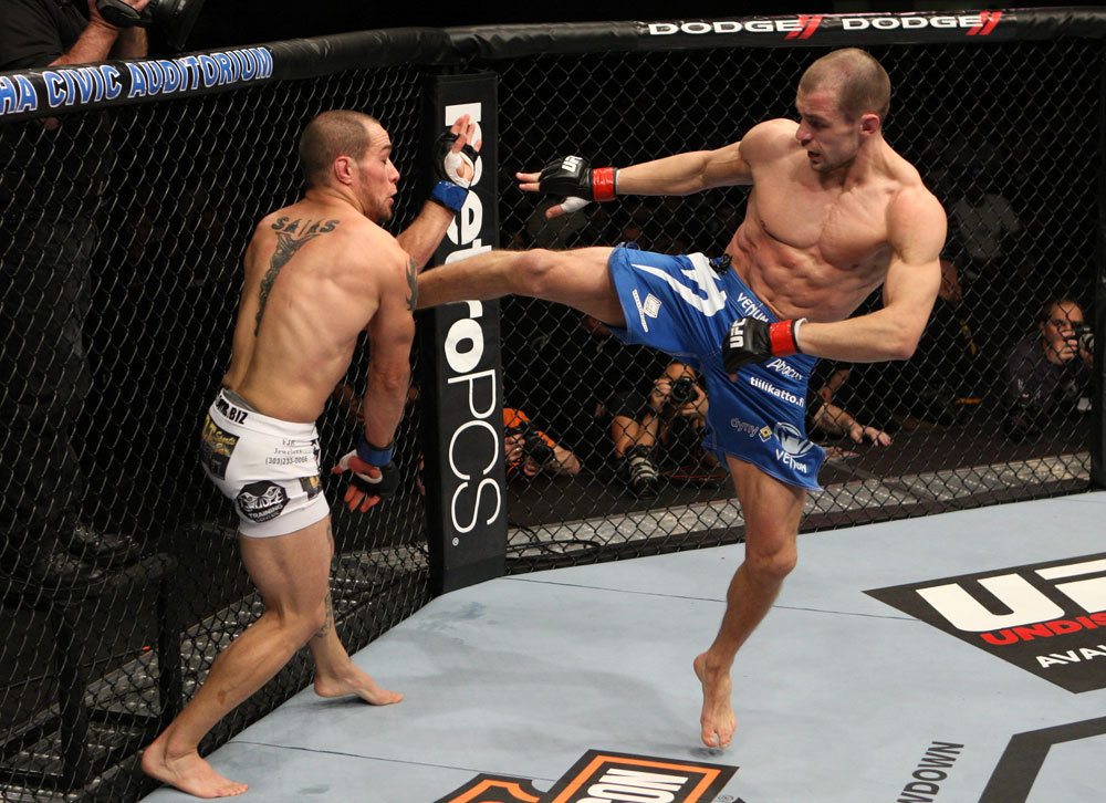 OMAHA, NE - FEBRUARY 15: (R-L) Anton Kuivanen kicks Justin Salas during the UFC on FUEL TV event at Omaha Civic Auditorium on February 15, 2012 in Omaha, Nebraska. (Photo by Josh Hedges/Zuffa LLC/Zuffa LLC via Getty Images) *** Local Caption *** Anton Kuivanen; Justin Salas