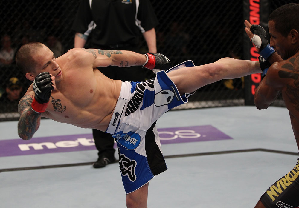 FAIRFAX, VA - MAY 15:  (L-R) Jeff Curran kicks Johnny Eduardo in a bantamweight bout during the UFC on Fuel TV event at Patriot Center on May 15, 2012 in Fairfax, Virginia.  (Photo by Josh Hedges/Zuffa LLC/Zuffa LLC via Getty Images)
