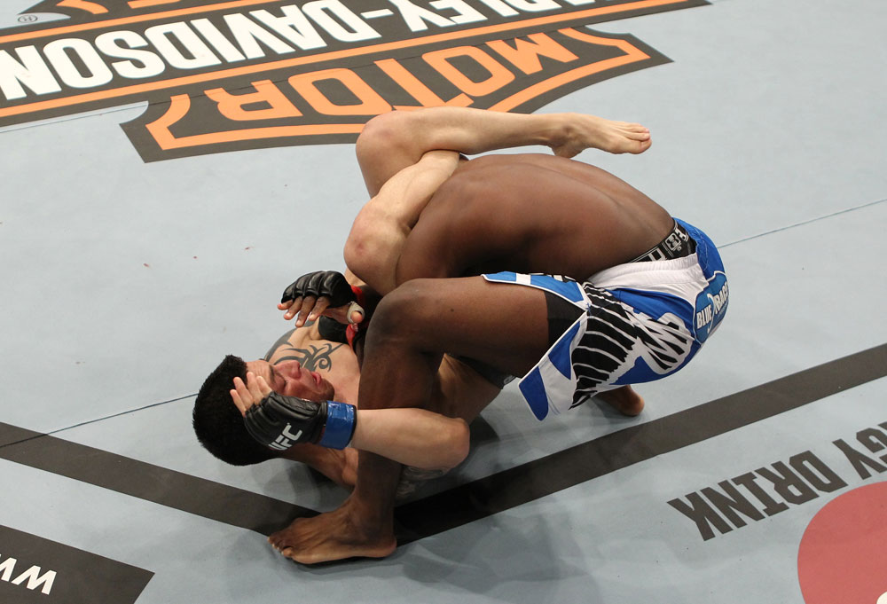 SYDNEY, AUSTRALIA - MARCH 03: (L-R) Daniel Pineda secures a triangle choke submission hold against Mackens Semerzier during the UFC on FX event at Allphones Arena on March 3, 2012 in Sydney, Australia. (Photo by Josh Hedges/Zuffa LLC/Zuffa LLC via Getty Images) *** Local Caption *** Mackens Semerzier; Daniel Pineda