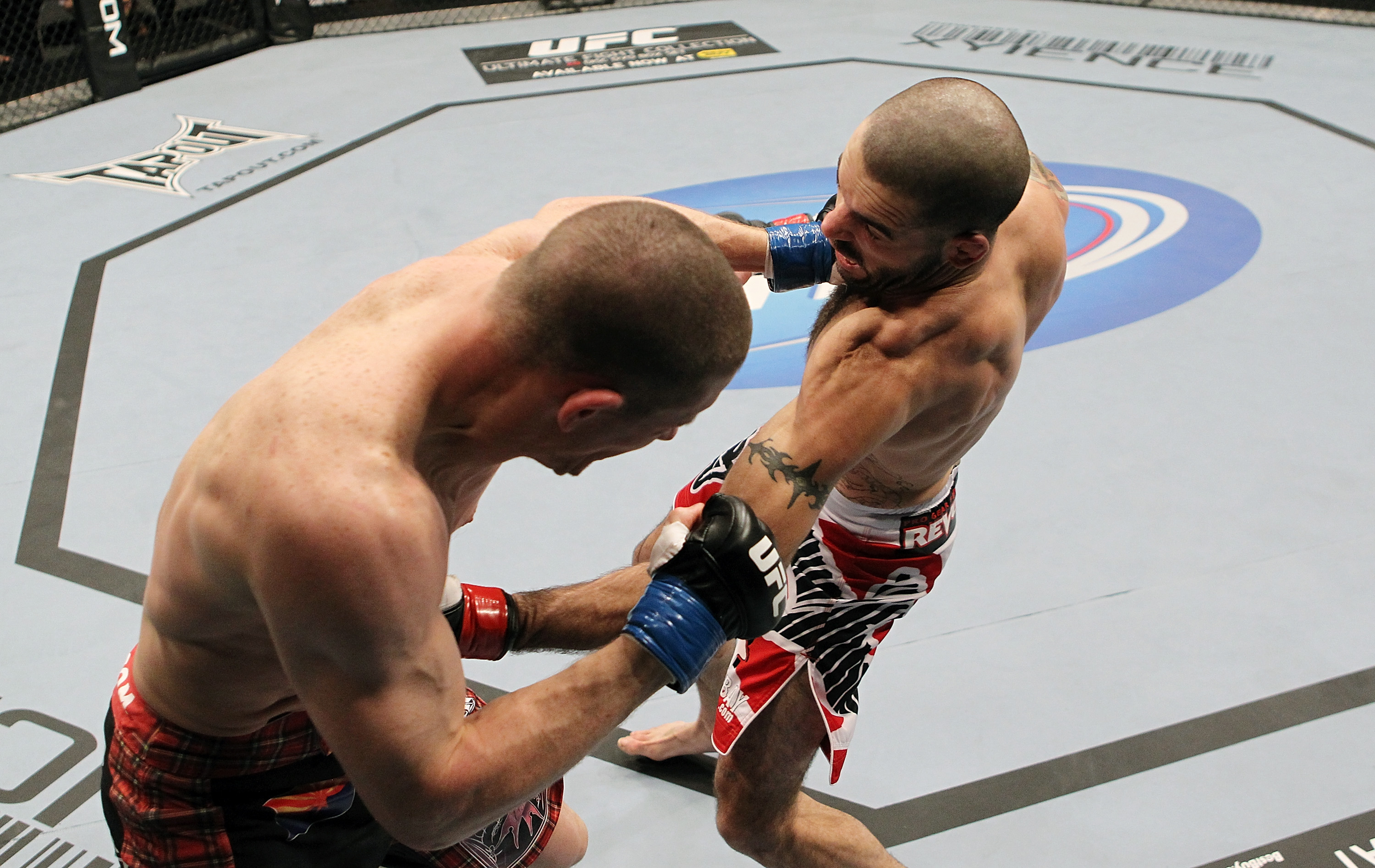 SAN JOSE, CA - NOVEMBER 19: (R-L) Matt Brown punches Seth Baczynski during an UFC Welterweight bout at the HP Pavillion on November 19, 2011 in San Jose, California. (Photo by Josh Hedges/Zuffa LLC/Zuffa LLC via Getty Images)