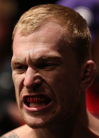 MINNEAPOLIS, MN - OCTOBER 05:  Bart Palaszewski prepares to enter the Octagon before his featherweight fight against Diego Nunes at the UFC on FX event at Target Center on October 5, 2012 in Minneapolis, Minnesota.  (Photo by Josh Hedges/Zuffa LLC/Zuffa LLC via Getty Images)
