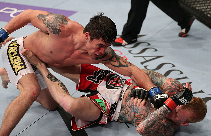 MINNEAPOLIS, MN - OCTOBER 05: (L-R) Diego Nunes punches Bart Palaszewski during their featherweight fight at the UFC on FX event at Target Center on October 5, 2012 in Minneapolis, Minnesota. (Photo by Josh Hedges/Zuffa LLC/Zuffa LLC via Getty Images)
