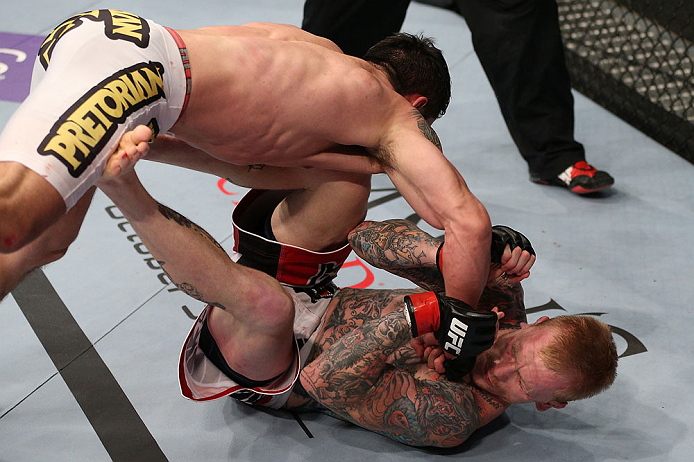 MINNEAPOLIS, MN - OCTOBER 05: (L-R) Diego Nunes punches Bart Palaszewski during their featherweight fight at the UFC on FX event at Target Center on October 5, 2012 in Minneapolis, Minnesota. (Photo by Josh Hedges/Zuffa LLC/Zuffa LLC via Getty Images)