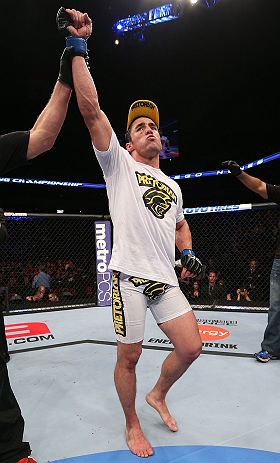 MINNEAPOLIS, MN - OCTOBER 05: Diego Nunes reacts after defeating Bart Palaszewski during their featherweight fight at the UFC on FX event at Target Center on October 5, 2012 in Minneapolis, Minnesota. (Photo by Josh Hedges/Zuffa LLC/Zuffa LLC via Getty Images)
